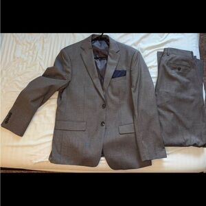 Calvin Klein Charcoal Suit with Navy Pocket Square